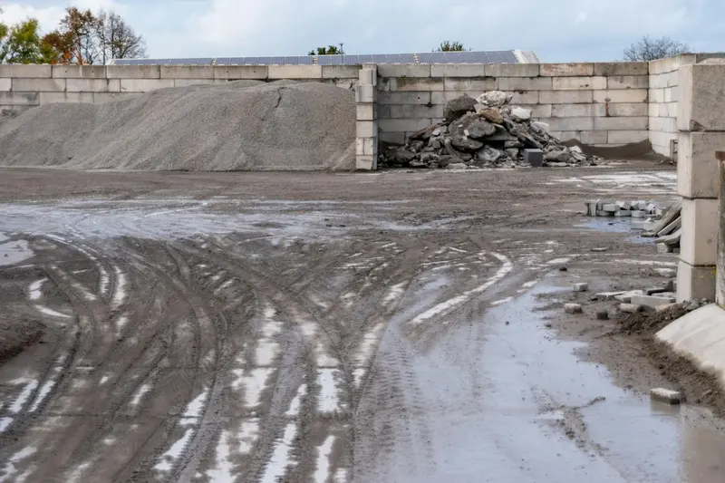 Piles of aggregate and construction rubble at a work site