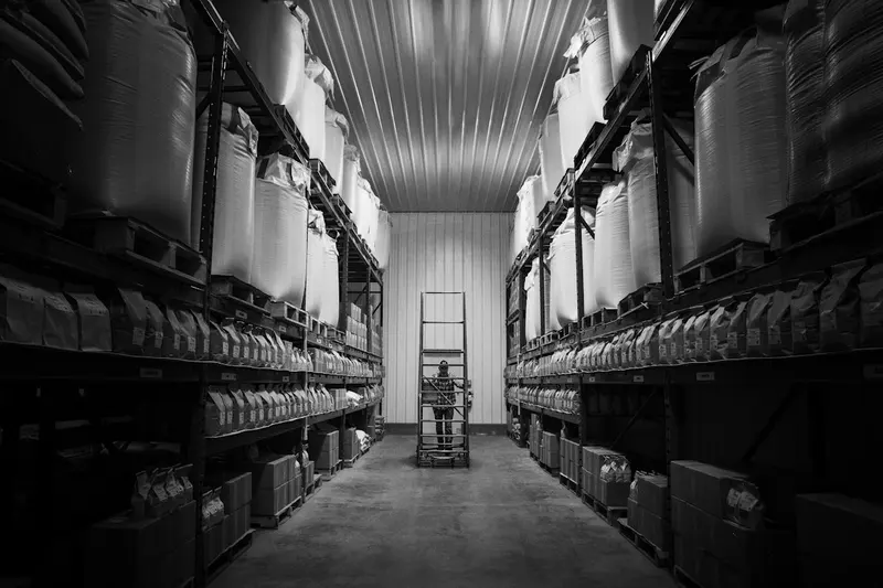 Shelves of storage containers in a commercial warehouse